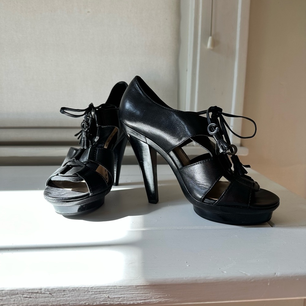 Black leather Coach heels